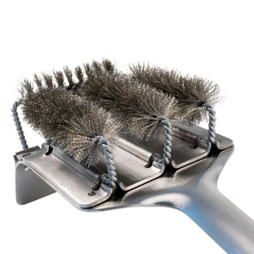 A grill brush with three brushes on it.