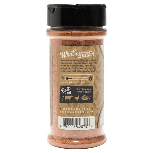 A jar of seasoning with the label for it.